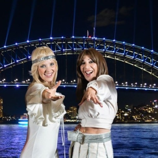 a person standing in front of a bridge