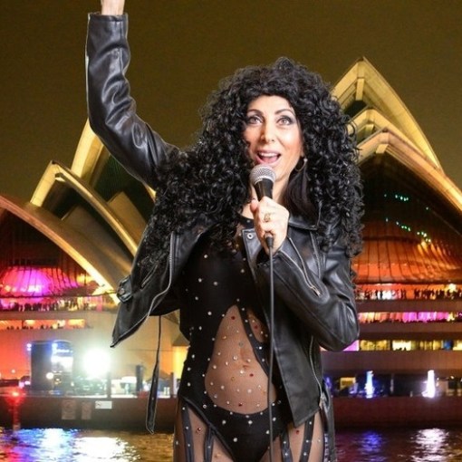 a person standing in front of water