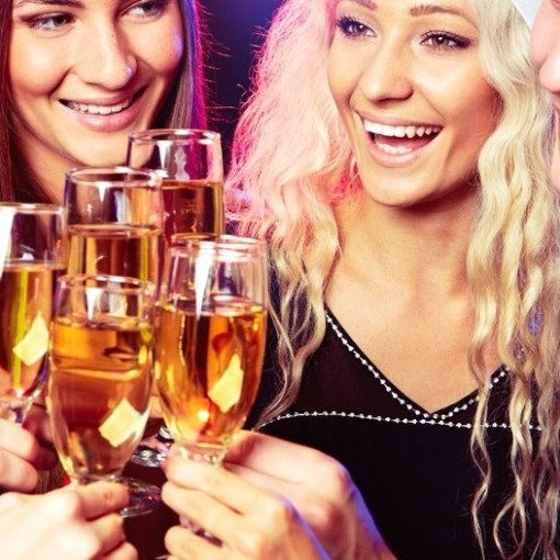 a woman holding a wine glass